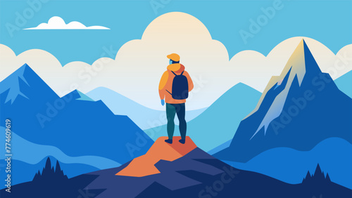 An outdoor adventurer stands at the top of a mountain taking in the breathtaking view. As they breathe in the fresh mountain air they feel a