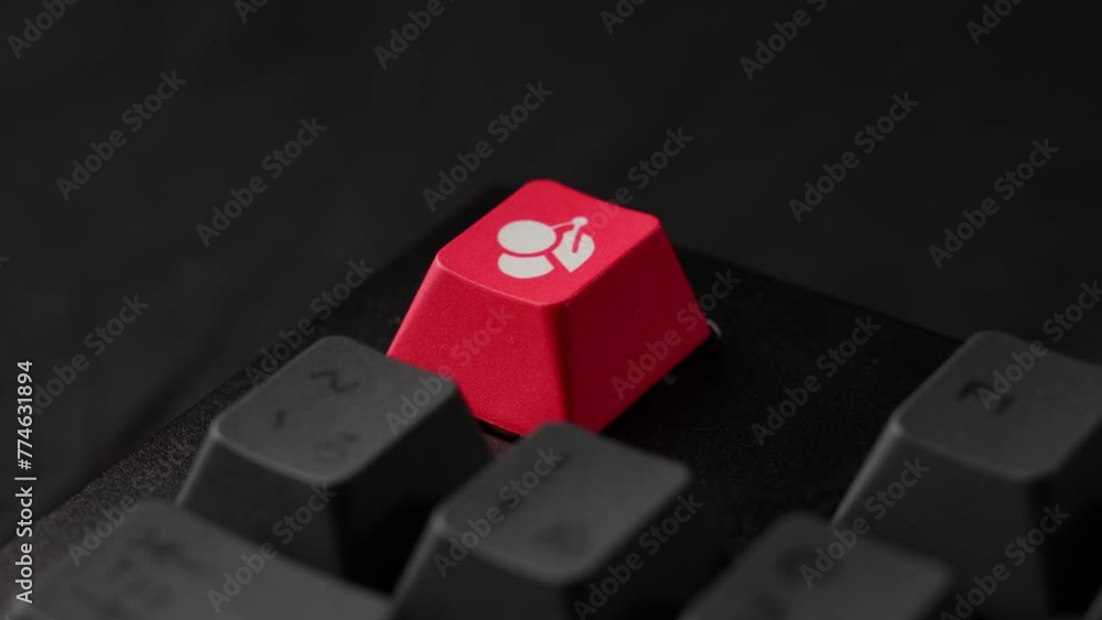 Red key on a mechanical keyboard, used for special functions Red key on a mechanical keyboard, used for special functions
