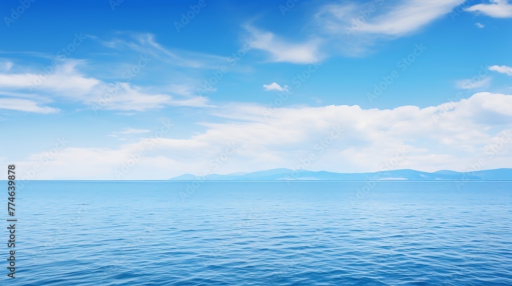 Fototapeta premium Blue sea and blue sky background.