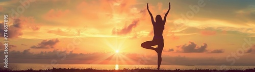 Woman's silhouette practicing yoga poses against a sunrise or sunset sky