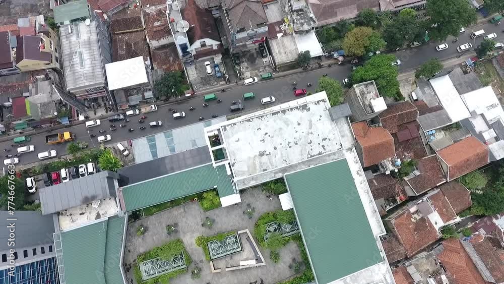 aerial view of the hotel rooftop during the day aerial view of the hotel rooftop during the day