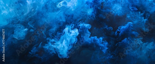 Azure blue smoke floating amidst a dreamy tapestry painted in shades of midnight black.