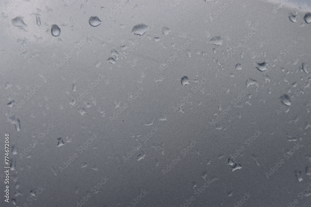 Water droplets on the surface of the car. Water droplets on the surface of the car.