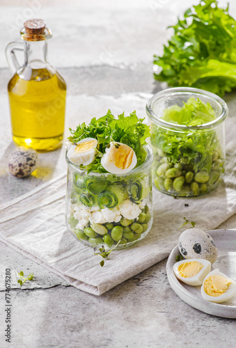 green salad in a jar with edamame beans