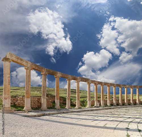 Forum (Oval Plaza) in Gerasa (Jerash), Jordan. Was built in the first century AD. Against the background of a beautiful sky with clouds.