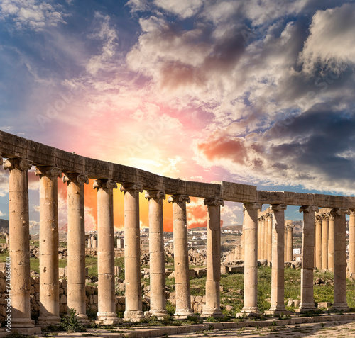 Forum (Oval Plaza) in Gerasa (Jerash), Jordan. Was built in the first century AD. Against the background of a beautiful sky with clouds. #774683000