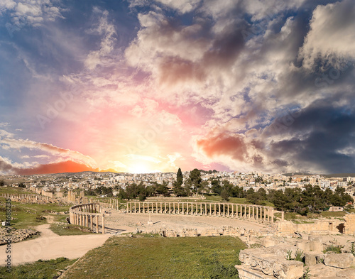 Forum (Oval Plaza) in Gerasa (Jerash), Jordan. Was built in the first century AD. Against the background of a beautiful sky with clouds.