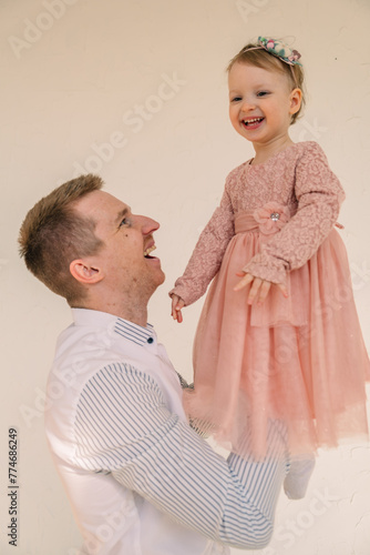 father with daughter having fun