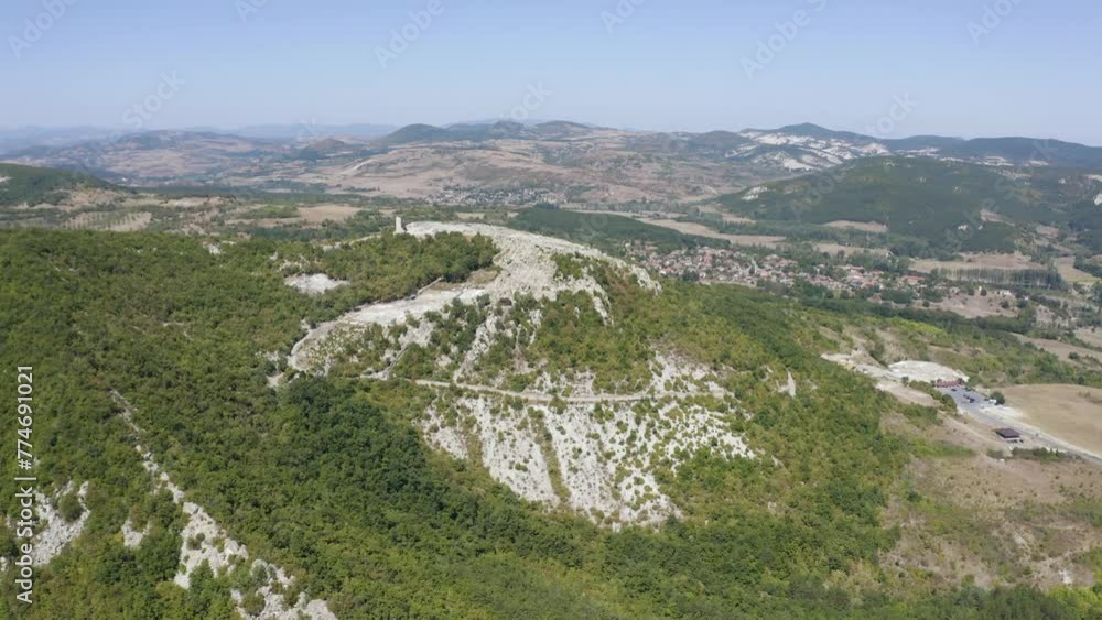 Approaching drone shot of a hill where the ancient rock city of Perperikon is located, in the province of Kardzhali in Bulgaria. Approaching drone shot of a hill where the ancient rock city of Perperikon is located, in the province of Kardzhali in Bulgaria.