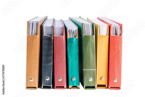 Group of Binders Stacked on Top of Each Other
