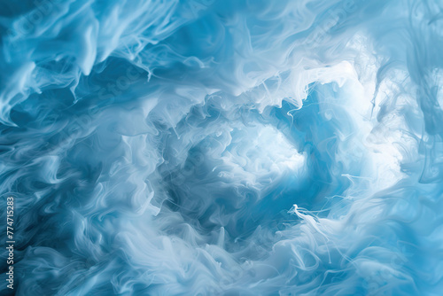 Abstract background of blue ink in water. Ink swirling in water.