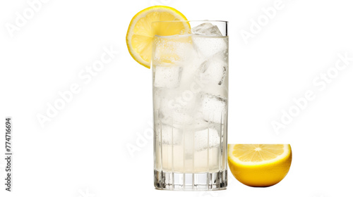 Tall glass filled with ice and lemon slices for a refreshing drink