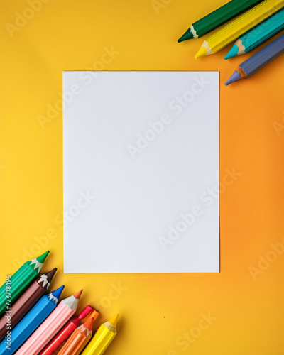photo of a single blank book page centered on the image. on a solid background. with crayons, the vibes are kid-party-friendly