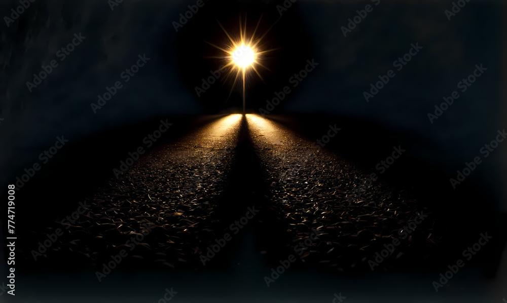 The image features a dark road with a bright light shining in the distance. The light forms an arrow shape, illuminating the path ahead. The image features a dark road with a bright light shining in the distance. The light forms an arrow shape, illuminating the path ahead.