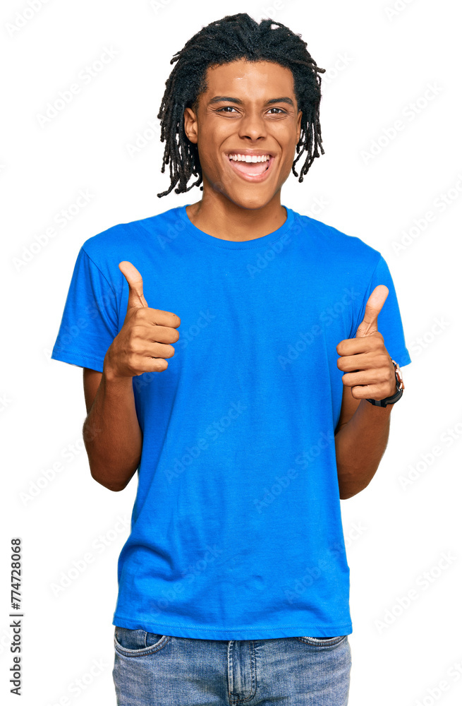 Young african american man wearing casual clothes success sign doing positive gesture with hand, thumbs up smiling and happy. cheerful expression and winner gesture. Young african american man wearing casual clothes success sign doing positive gesture with hand, thumbs up smiling and happy. cheerful expression and winner gesture.