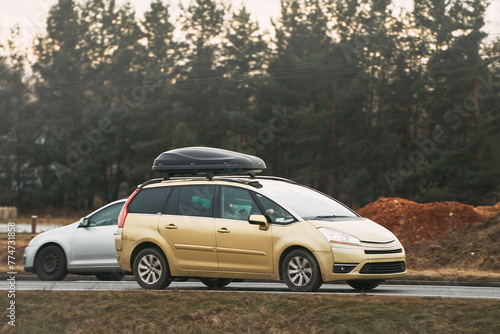 Family SUV Ready for Adventure with Roof Luggage Rack © AlexGo