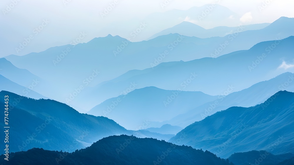 Serene and Misty Mountain Valley Landscape with Layers of Hazy Blue Ridges Capturing the Grandeur of the Wilderness - obrazy, fototapety, plakaty 