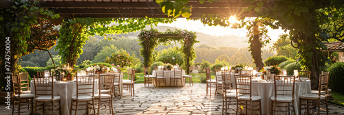 Sundown sparkle at an elegant garden wedding reception. Warm ambient lighting over outdoor banquet tables. Nuptial celebration decor theme for design and print. Wide-angle view with copy space photo