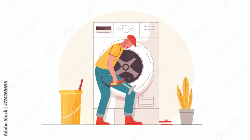 Plumber repairing washing machine with screwdriver
