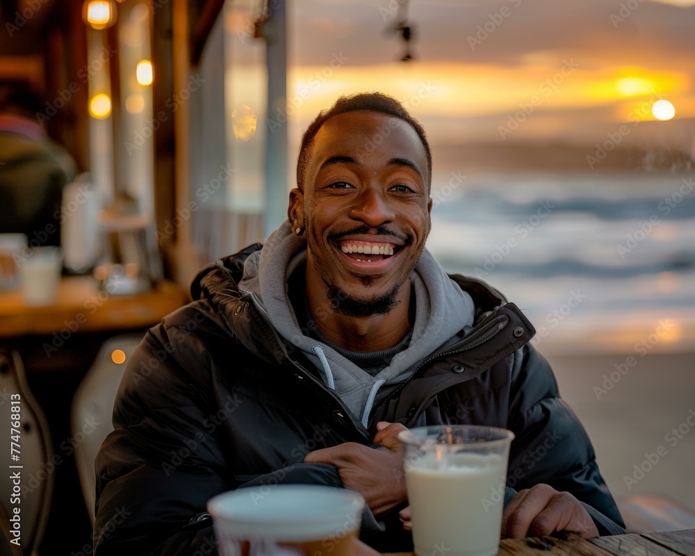 A man sitting at a table with his drink and food. Generative AI.