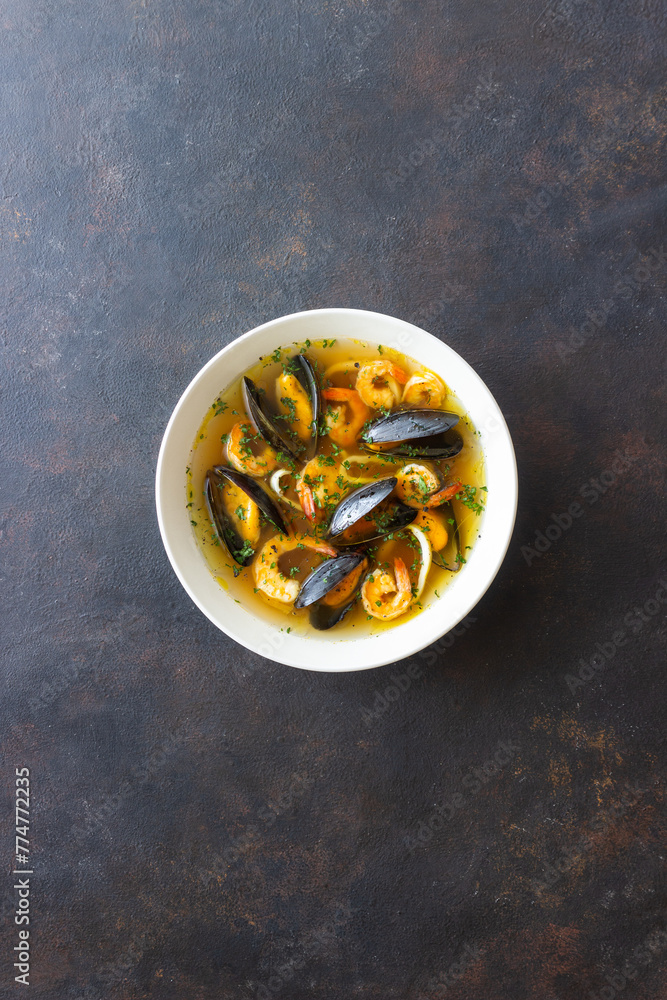 Soup with mussels, shrimps and squid. Healthy eating. Seafood. Soup with mussels, shrimps and squid. Healthy eating. Seafood.
