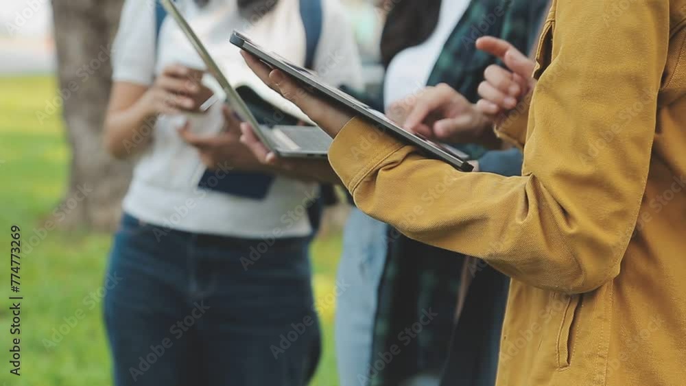 Group of Young Asian student walking and talking at university before class room. education, back to school concept Group of Young Asian student walking and talking at university before class room. education, back to school concept