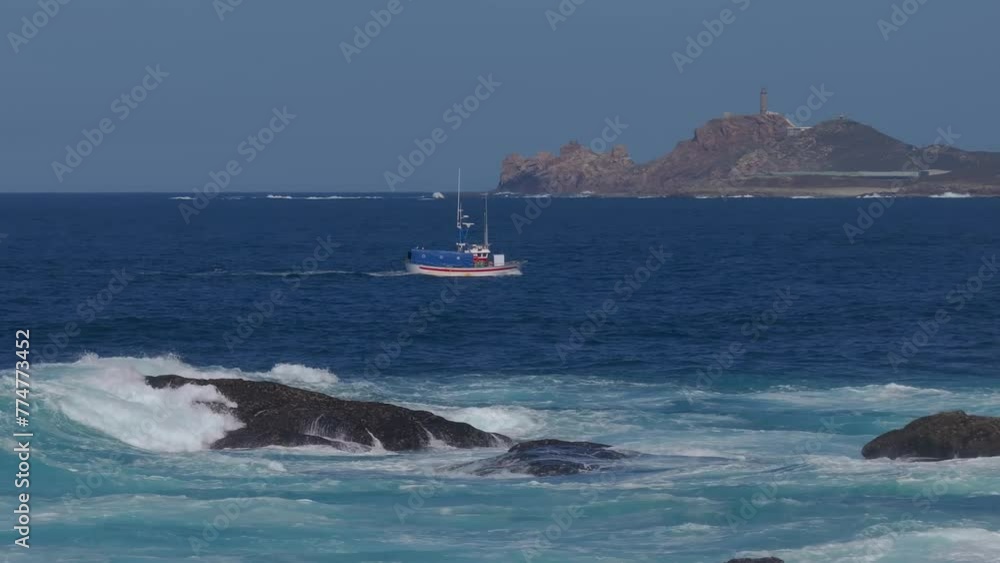 Fishing Boat At The Sea With Rough Waves In Muxia, A Coruna Galicia, Spain. Slow Motion Shot Fishing Boat At The Sea With Rough Waves In Muxia, A Coruna Galicia, Spain. Slow Motion Shot
