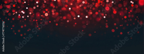 Abstract blur bokeh banner background. Ruby bokeh on defocused charcoal background.