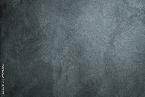 Black stone background, concrete dark surface or wall. Free space for design or text. photo