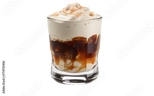 A tall glass contains rich vanilla ice cream surrounded by glistening ice cubes and a cascade of caramel sauce