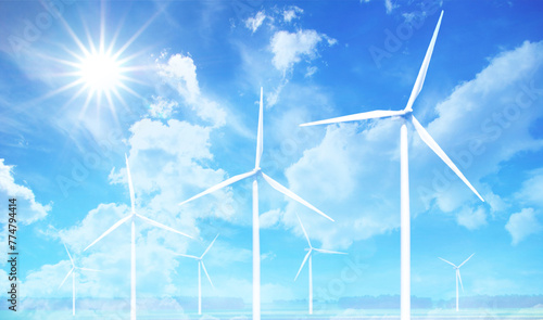 Wind turbines on Blue Sky with Sun Flares. Series of turbines tilt upwards towards the clear blue sky, where the sun shines brightly casting a flare. Perfect day for harnessing wind energy.