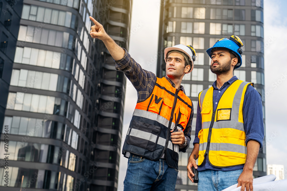Contractor, Two civil engineers checking information from blueprint with teamwork, project manager planning and collaboration, outdoor construction worker and floor plan for urban development in city Contractor, Two civil engineers checking information from blueprint with teamwork, project manager planning and collaboration, outdoor construction worker and floor plan for urban development in city