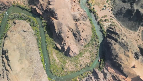 Charyn Canyon, Kazakhstan. Aerial drone view of the Sharyn National Park. Top down spinning shot above canyon river and cliffs. Famous travel landmark destination in Qazaqstan, Central Asia