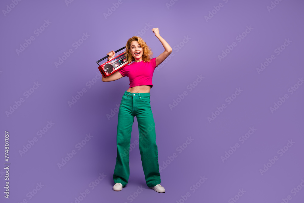 Photo of good mood positive woman wear trendy pink clothes listen music yes weekend chill isolated on purple color background - obrazy, fototapety, plakaty 