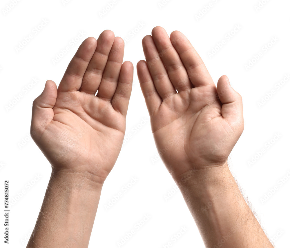 Religion. Man with open palms praying on white background, closeup Religion. Man with open palms praying on white background, closeup