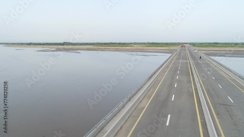 Aerial view of layyah taunsa bridge over the Indus River in Southern Punjab Pakistan. Beautiful 4K Drone Footage. photo