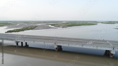 Aerial view of layyah taunsa bridge over the Indus River in Southern Punjab Pakistan. Beautiful 4K Drone Footage. photo