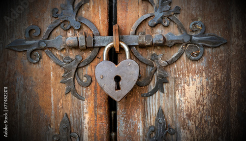 Close-up of an old wooden door with a large wrought iron latch and heart-shaped padlock. Generative Ai.
