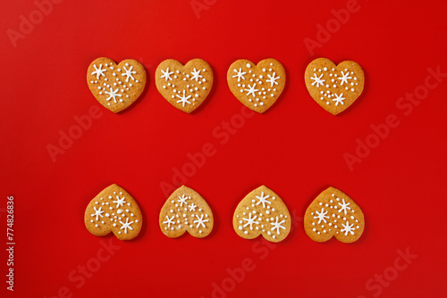 beautiful hand-baked cookies in the shape of a heart on a red background