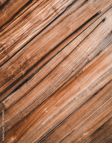 Natural background image with different brownish shades of wooden planks.