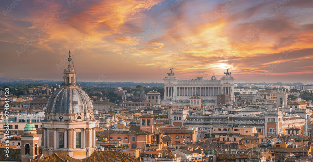 Aerial panoramic cityscape of Rome, Italy, Europe. Roma is the capital of Italy. Cityscape of Rome in summer. Rome roofs view with ancient architecture in Italy. Rome architecture and landmark.