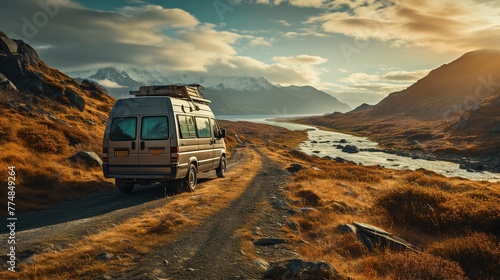 Motorhome in the mountains with a landscape view. Nice landscape view with a motorhome. Travel van.
