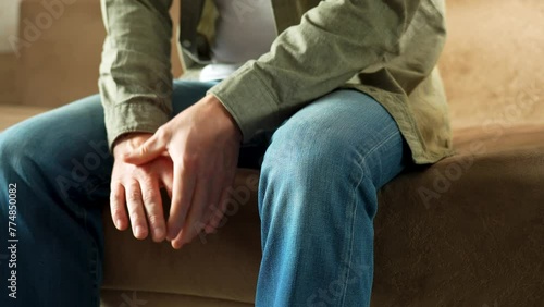 Close-up of Man With Parkinson Disease Symptom.