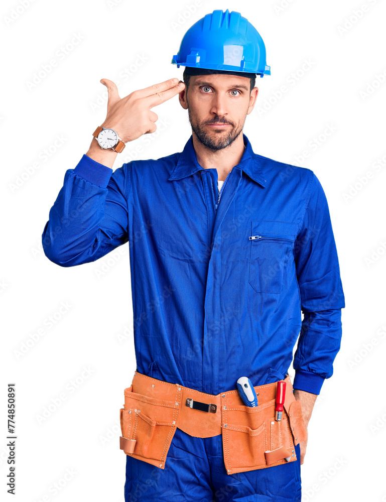 Young handsome man wearing worker uniform and hardhat looking stressed and nervous with hands on mouth biting nails. anxiety problem. Young handsome man wearing worker uniform and hardhat looking stressed and nervous with hands on mouth biting nails. anxiety problem.