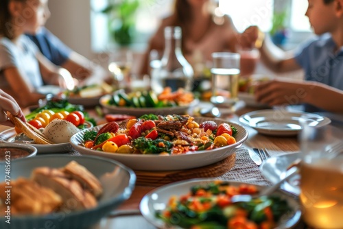 A family savors a meal crafted from local ingredients, embracing the mindful eating ethos, fostering familial connection. photo