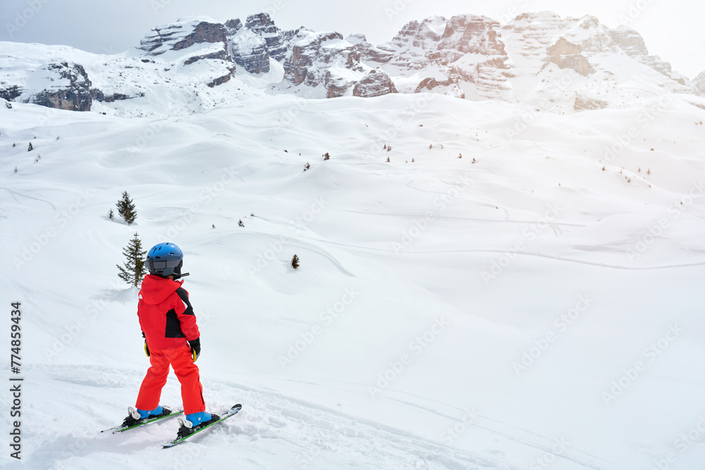 Picture of happy boy in skies Madonna di Campiglio