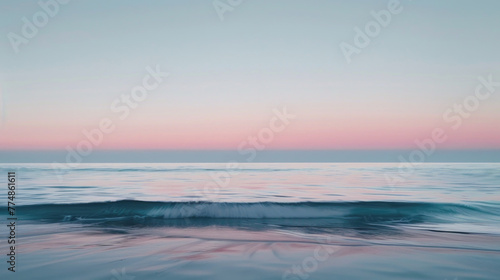 A blurred view of a body of water, displaying ripples and reflections under a cloudy sky © sommersby