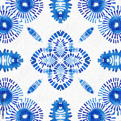Indigo blue tie-dye handmade textile seamless pattern. Asian style abstract blotched dyed effect print.