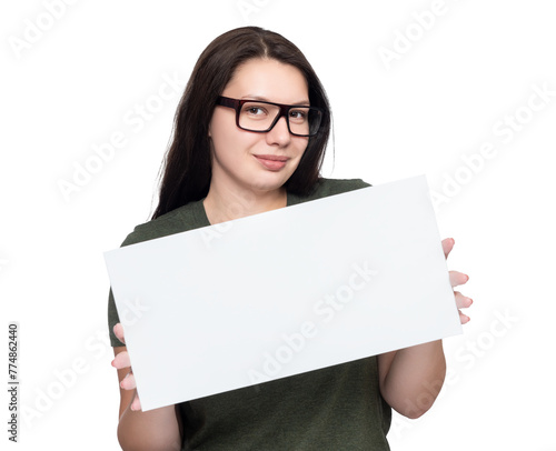 A young pretty happy girl with glasses holds a white blank poster in her hands, isolated on a transparent background png