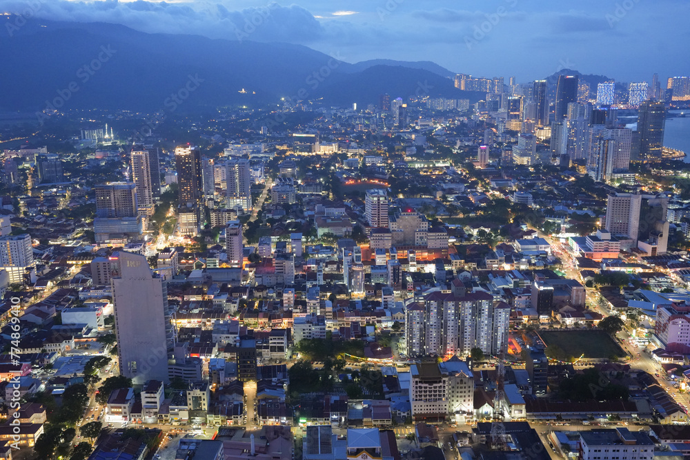Fototapeta premium A view of the cityscape of Penang in Malaysia during the blue hour of the day.